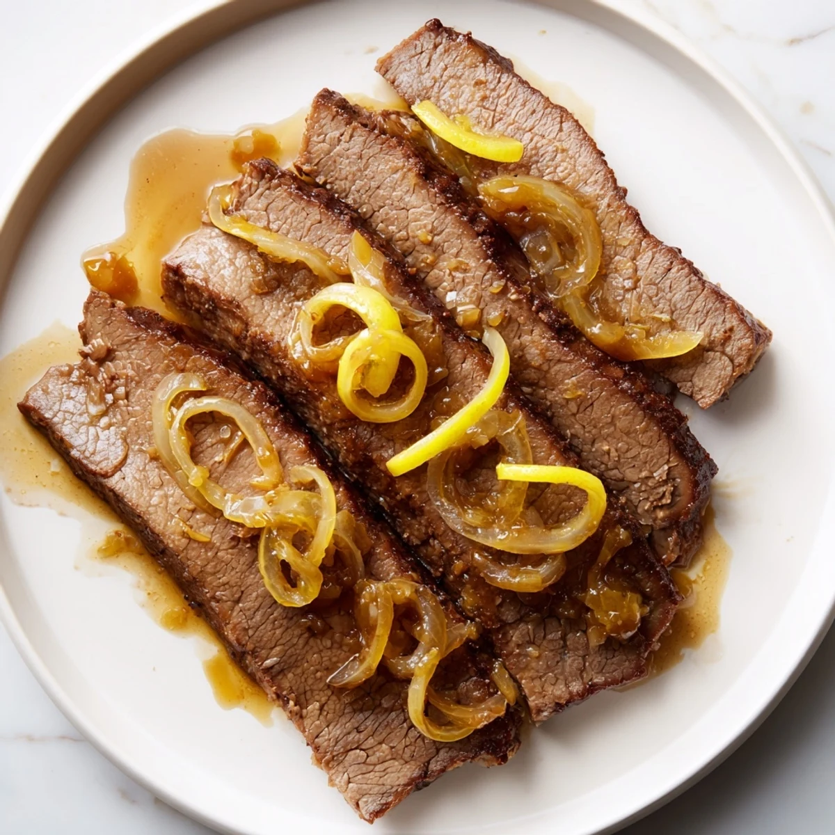 Beautifully plated slow cooked beef brisket, ready to serve with sides, offers comforting family meal options.