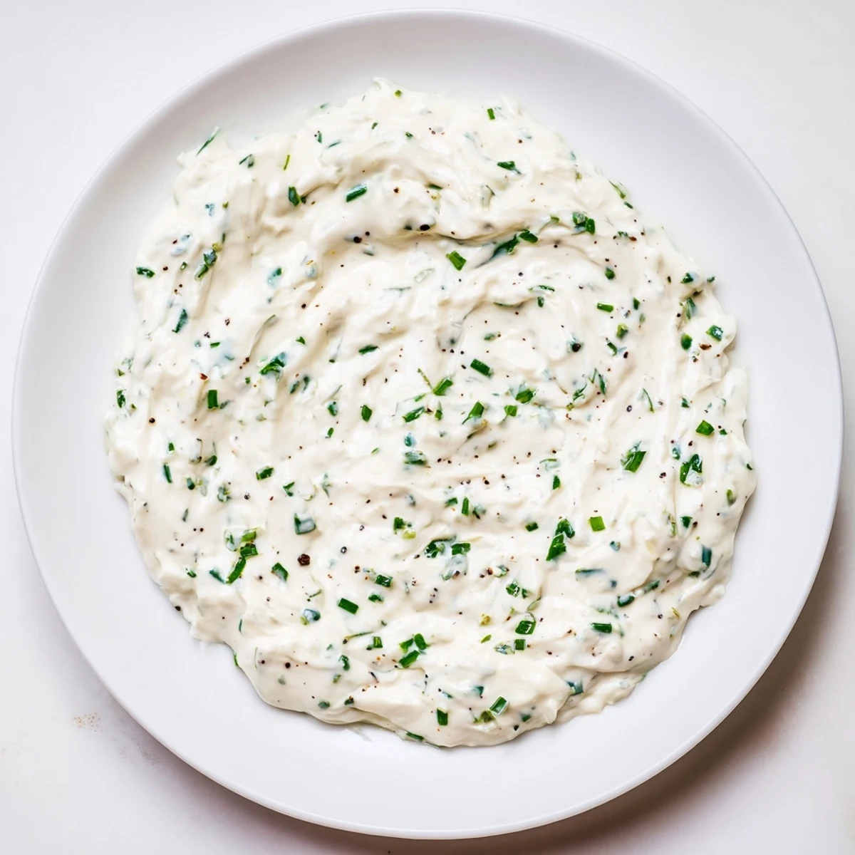 Freshly made garlic dip, a vibrant appetizer perfect for sharing with friends and family.