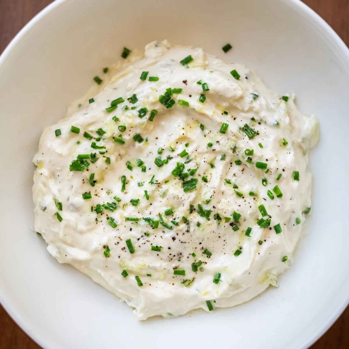Close-up of garlic dip, showing the creamy texture and inviting aroma, ready to be enjoyed.