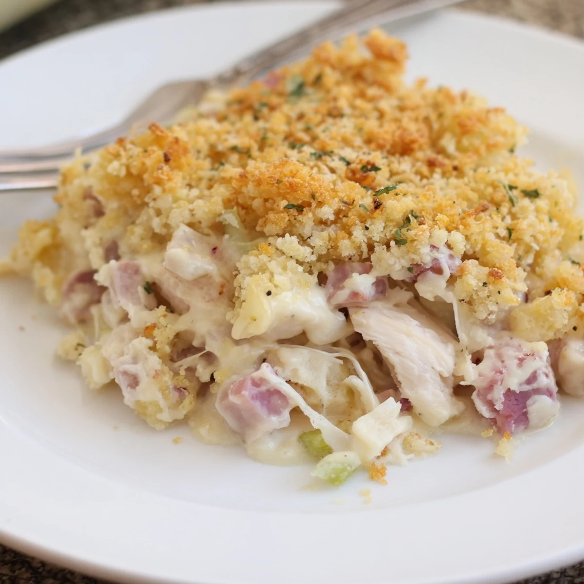 Chicken Cordon Bleu Casserole Recipe bubbling golden, creamy Dijon sauce, crunchy breadcrumb topping