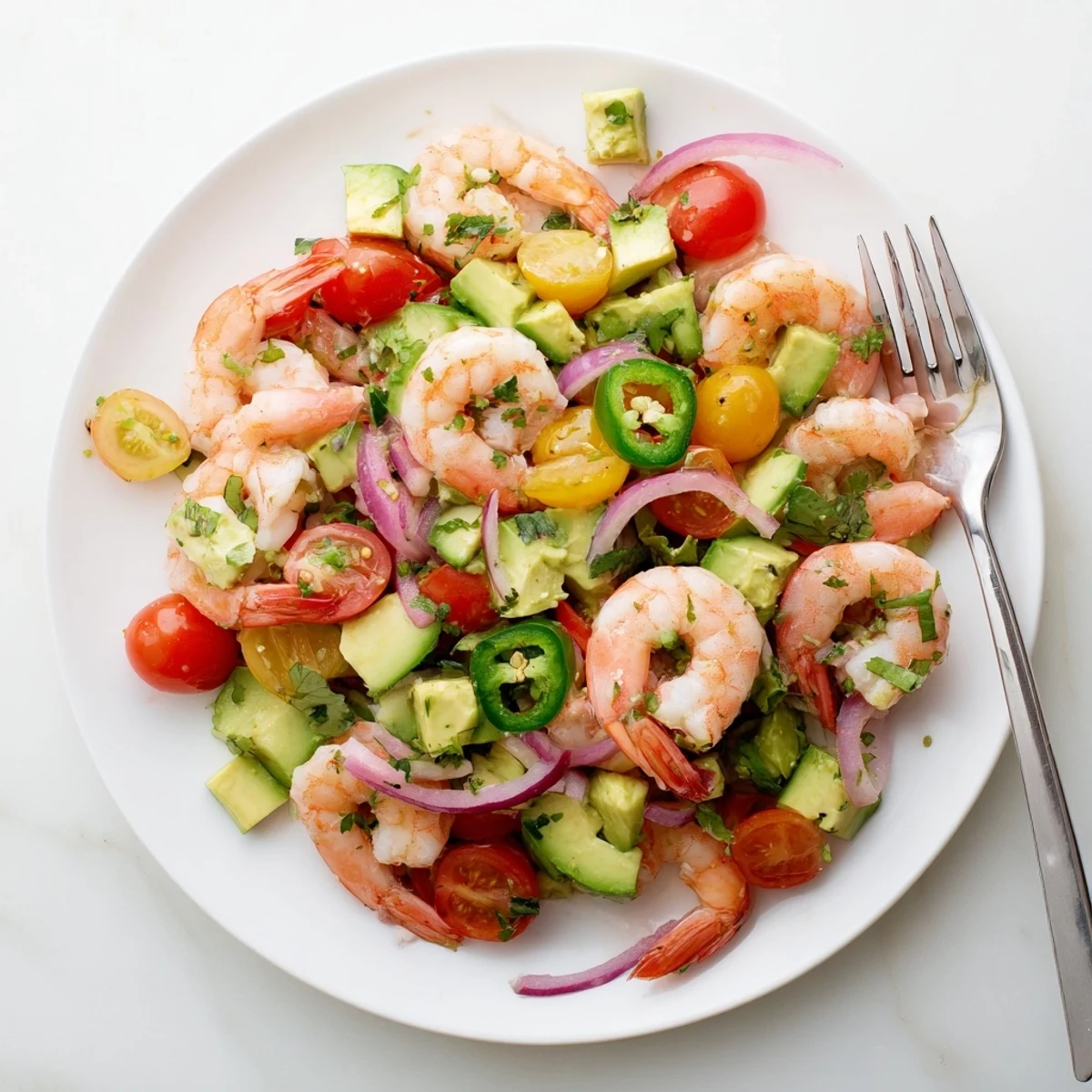 Glowing shrimp avocado salad recipe featuring plump seafood, creamy avocado chunks, and crisp mixed greens